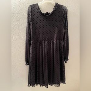 Black long sleeve polka dot mesh dress.